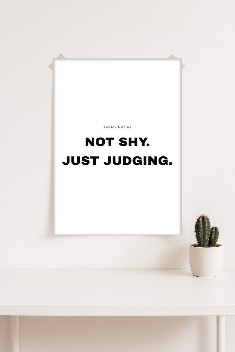 Poster „Not shy. Just judging.“ im Raum